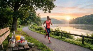 a person jogging at sunrise, healthy meal nearby, calm environment